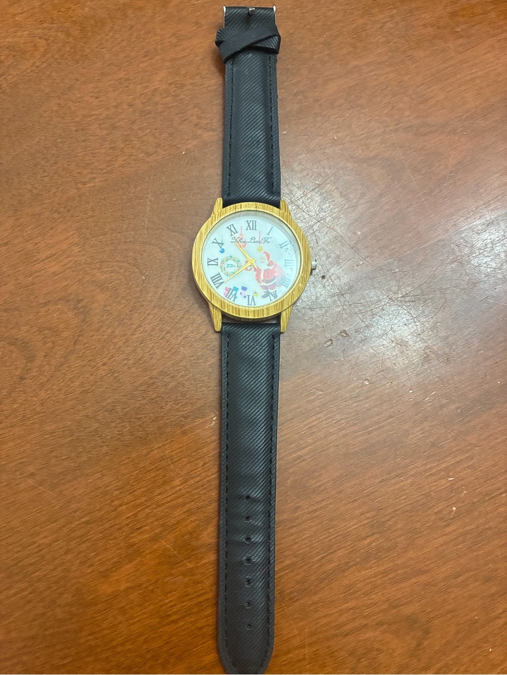 SHEIN Black Strap Watch with Gold-Tone Case and Playful Dial